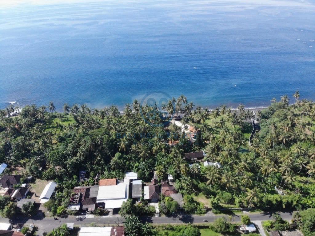 are land absolute beachfront in seraya for sale