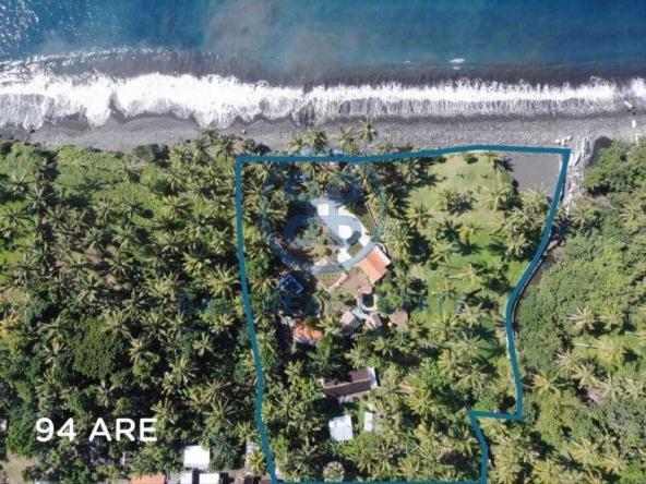 are land absolute beachfront in seraya for sale