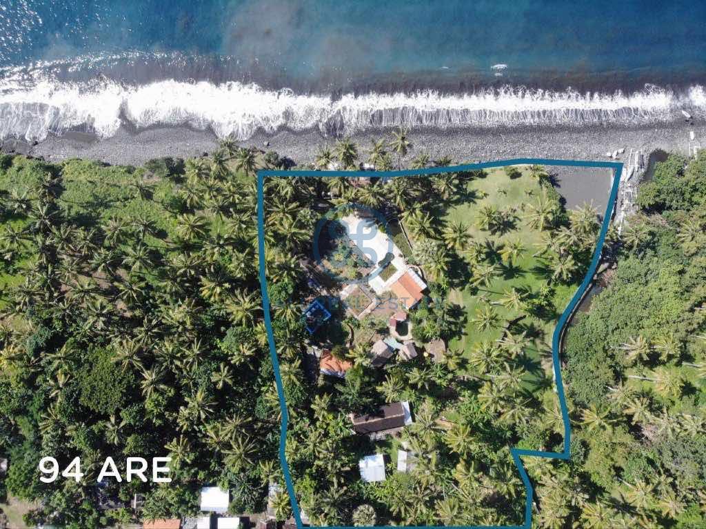 are land absolute beachfront in seraya for sale