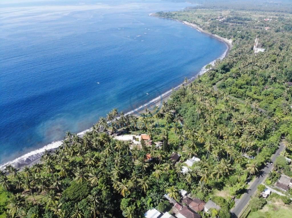 are land absolute beachfront in seraya for sale